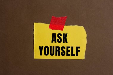Ask yourself message written on ripped torn paper background. Conceptual Ask yourself symbol. Copy space.