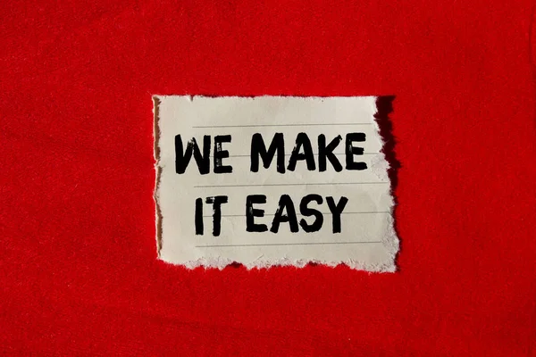 We make it easy message written on ripped torn paper background. Conceptual We make it easy symbol. Copy space.