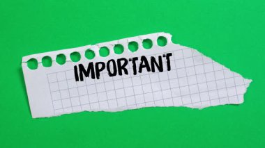 Important announcement message writing on ripped torn paper background