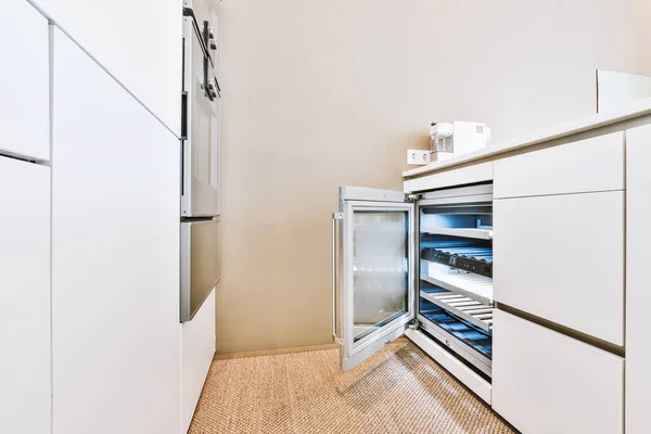 Modern wine cabinet in kitchen — Stock Photo, Image