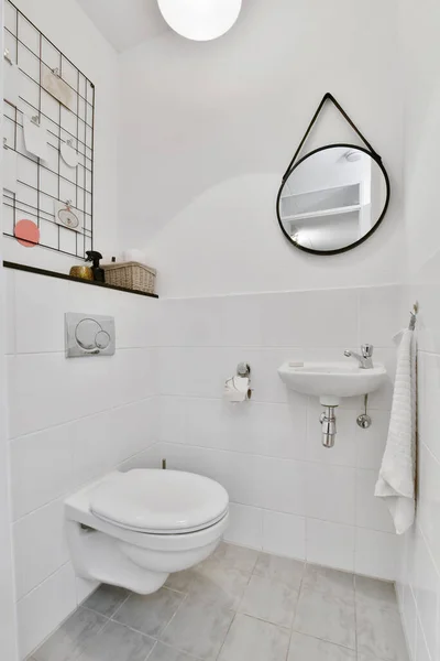 Lavatory with toilet and sink — Stock Photo, Image