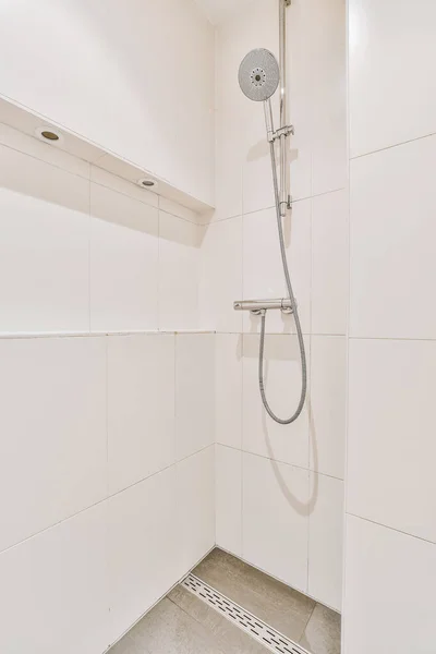 Shower tap in tiled bathroom — Stock Photo, Image