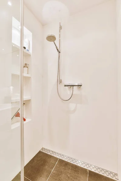 Shower tap in tiled bathroom — Stock Photo, Image