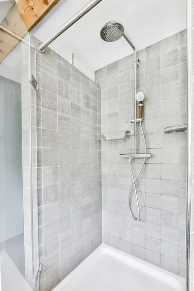 Shower tap in tiled bathroom — Stock Photo, Image