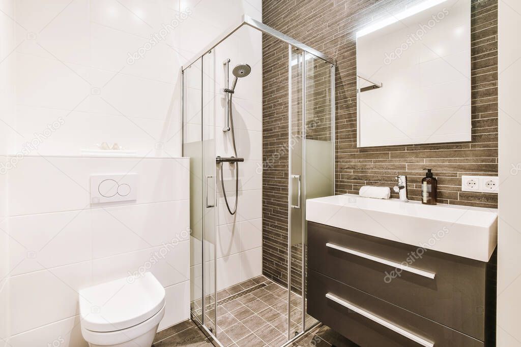Bathroom with shower cabin and toilet