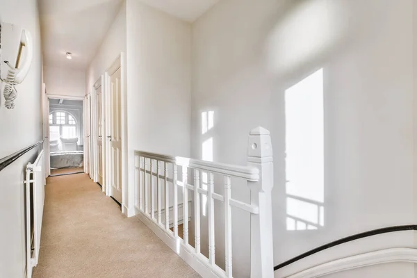 Hall of house with staircase and mirror wardrobe — Stock Photo, Image