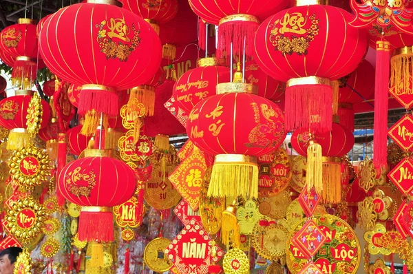 Nha Trang, Vietnam - February 7, 2016: Red lanterns and lucky items are for sale in the lunar new year on the street of Vietnam — Stock Photo, Image