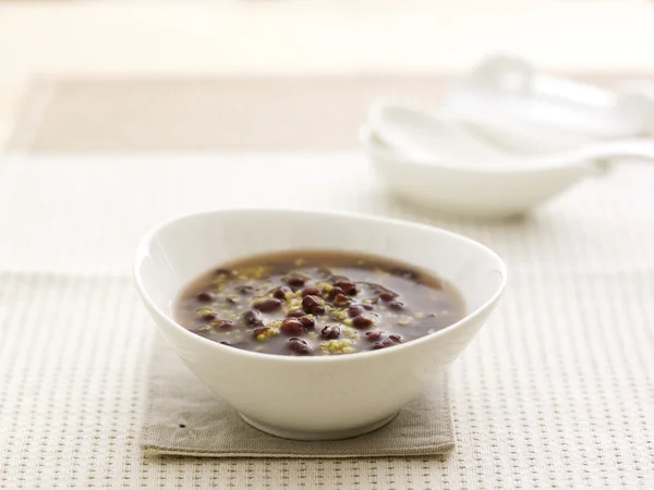 Red beans millet gruel on white bowl — Stock Photo, Image