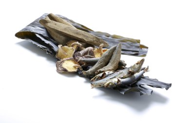 Dried food of mushroom and mackerel fish on white background clipart