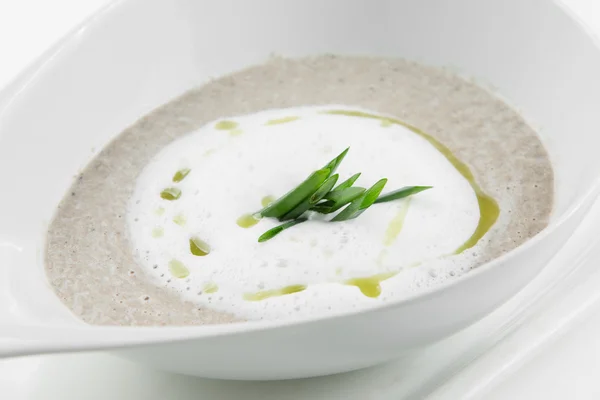 Champignon crème soep "cappuccino" op witte bowl — Stockfoto