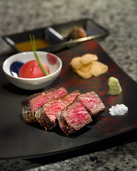 Delicious roasted Teppanyaki Japanese Yaeyama wagyu beef with wa — Stock Photo, Image