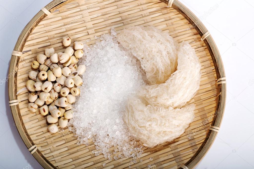 Bird's nest or salanganes with lotus beans on a white background
