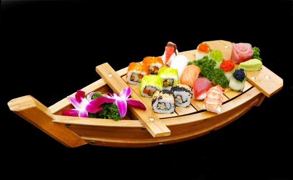 A boat of sushi — Stock Fotó