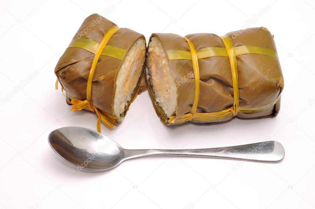 Vietnamese Cylindrical Sticky Rice Cake or Banh Tet on a white background