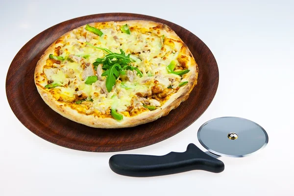 Chicken Pasta on Tray and Pizza Cutter on white — Stock Photo, Image