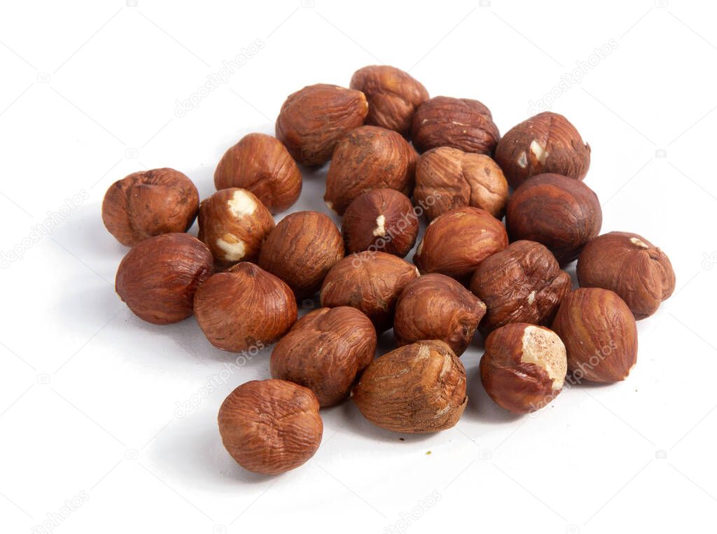 Hazelnuts isolated on white background