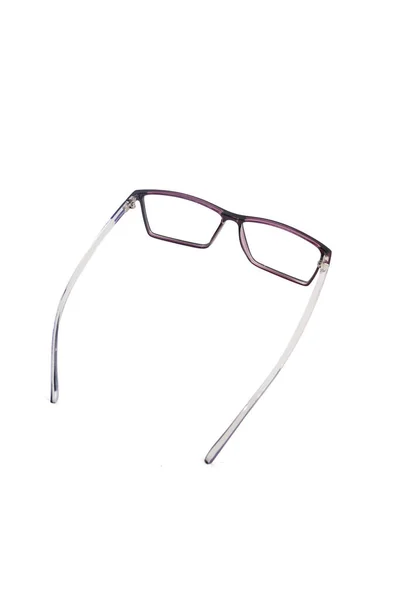 배경에 안경을 보라색 사각형 안경테 위에서 사진에서 배경에 네모난 안경테들 — 스톡 사진