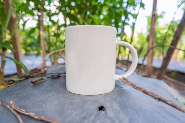 white coffee mug with nature background. cup mockups. mug mockups