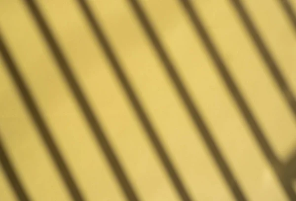 Shadow of Lines on yellow pape