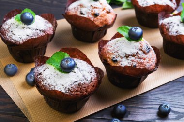 Six berry muffins with berries blueberry