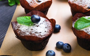 Six berry muffins with berries blueberry