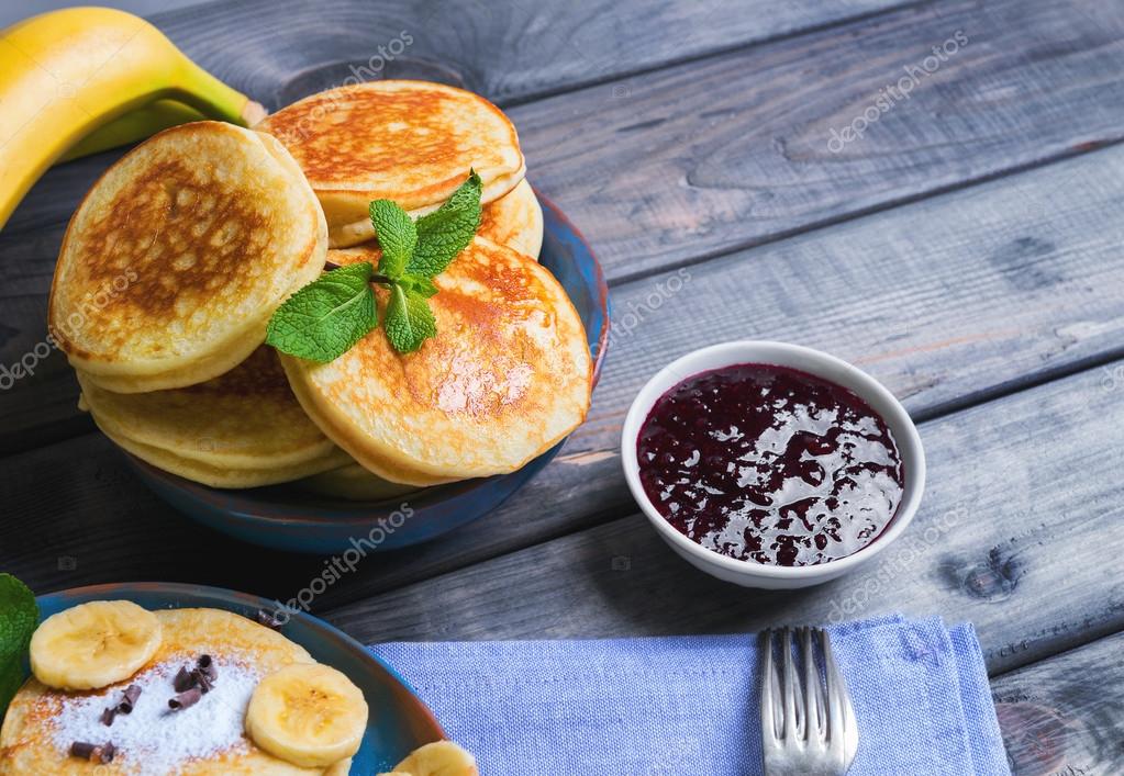 Beautiful breakfast frieds banana fritter decorated additives Stock