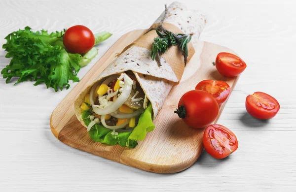 Burrito wrapped in tortilla bread — Stock Image Burrito wrapped in tortilla bread Royalty Free Stock Images