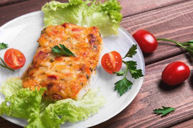 white plate glass portion of the baked cod fish