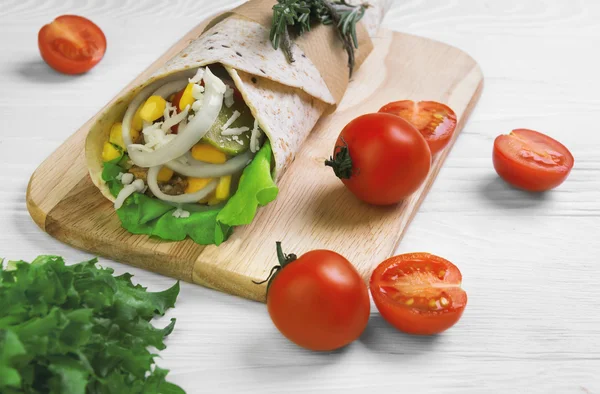 Burrito wrapped in tortilla bread — Stock Image Burrito wrapped in tortilla bread Royalty Free Stock Photos