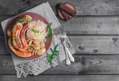 Sauerkraut with fried Munich sausages