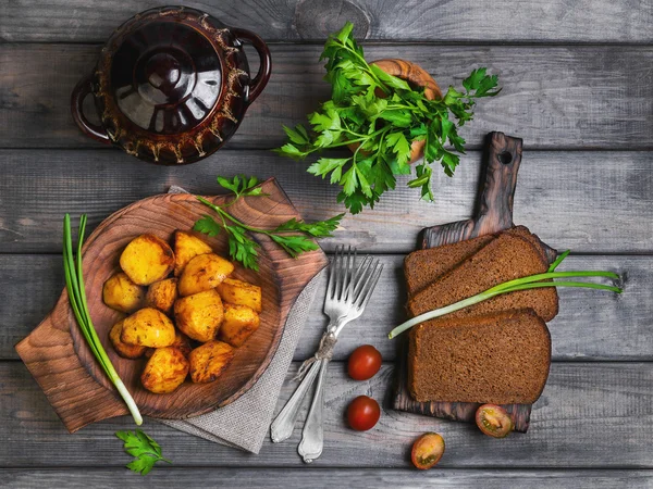 Baked potatoes roasted pieces — Stock Photo, Image