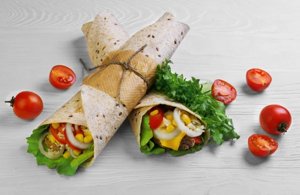 Burrito wrapped in tortilla bread — Stock Image Burrito wrapped in tortilla bread Stock Photo