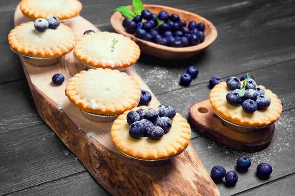 Closed berry tartlets baskets — 图库照片