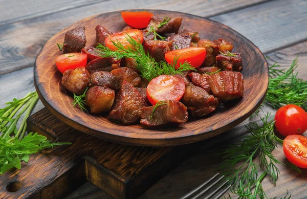 Meat fried small pieces of roast goulash