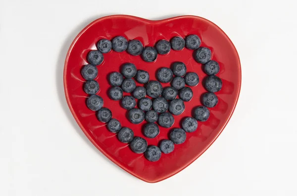 Heart blueberries plate — Stock Photo, Image