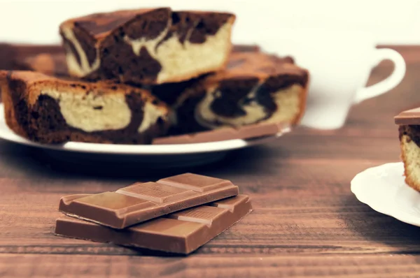 Marble cake in white plate cut into pieces a la carte — ストック写真