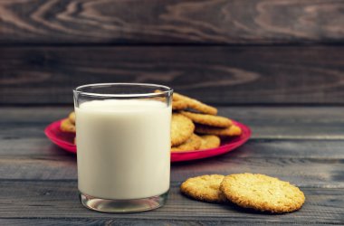 On the rustic wooden table is breakfast