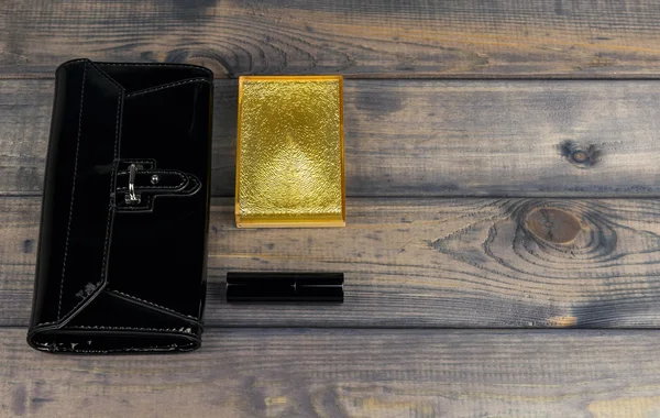 Purse-clutch black, powder box with mirror and lipstick golden l — Stock Photo, Image