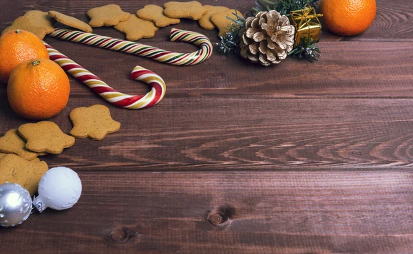 On a wooden desk background Christmas composition — Zdjęcie stockowe