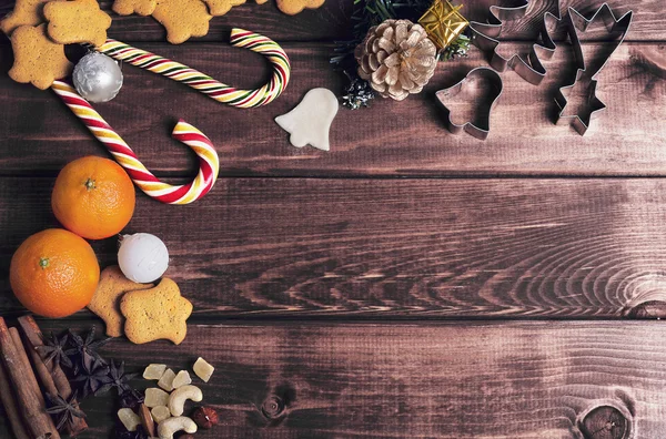 On a wooden desk background Christmas composition — Stok fotoğraf