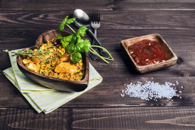 Paella On a wooden table