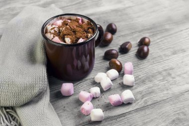 metal mug with hot chocolate, marshmallows