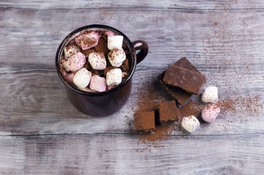 metal mug with hot chocolate, marshmallows