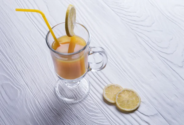 Orange juice, drinking straw yellow, lemon slices — 스톡 사진