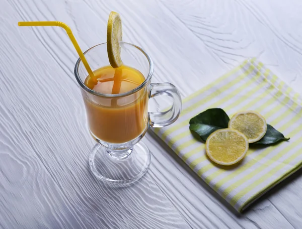 Orange juice, drinking straw yellow, lemon slices — 스톡 사진