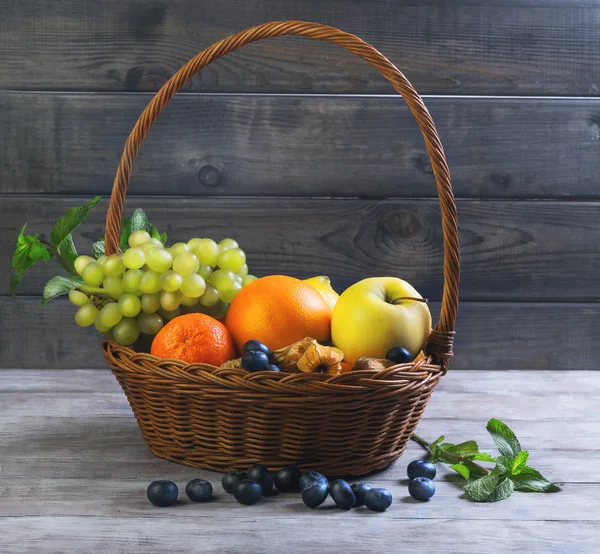 Wicker straw basket with an assortment of fruits 