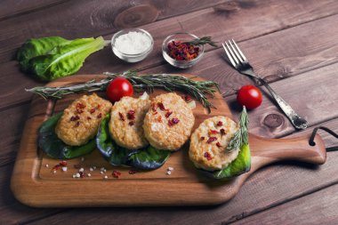 On a brown background wooden cutting board in a rustic style wit