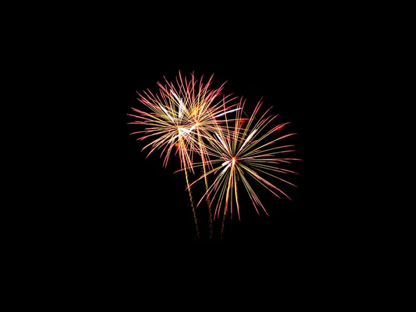 Fuochi d'artificio colorati di vari colori su sfondo nero — Foto Stock