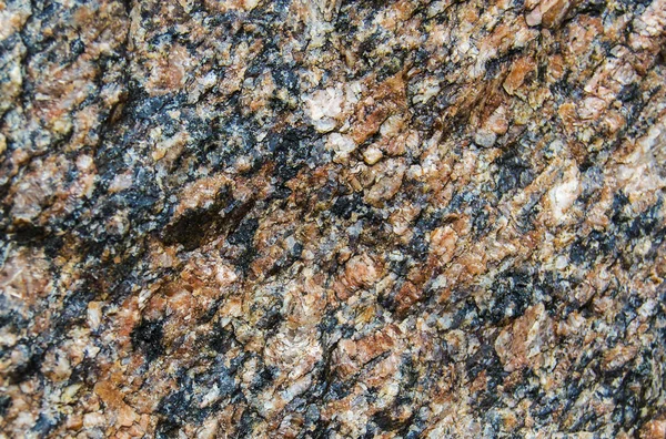 La superficie della pietra granitica — Foto Stock