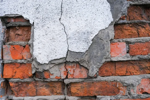 Close up brick wall, broken red brick background, selective focus